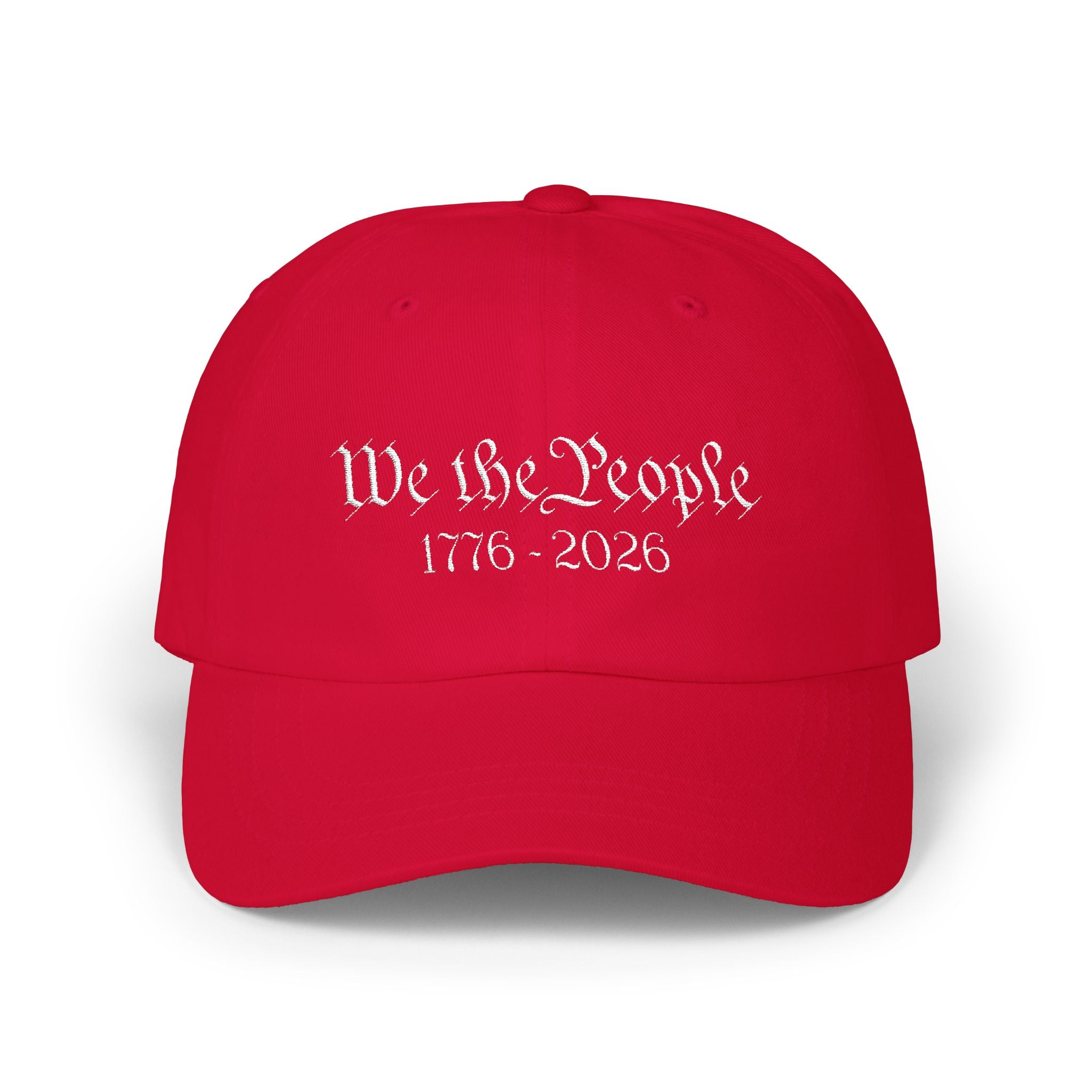 Cranberry red cap with embroidered 'We the People 1776-2026' against a white background