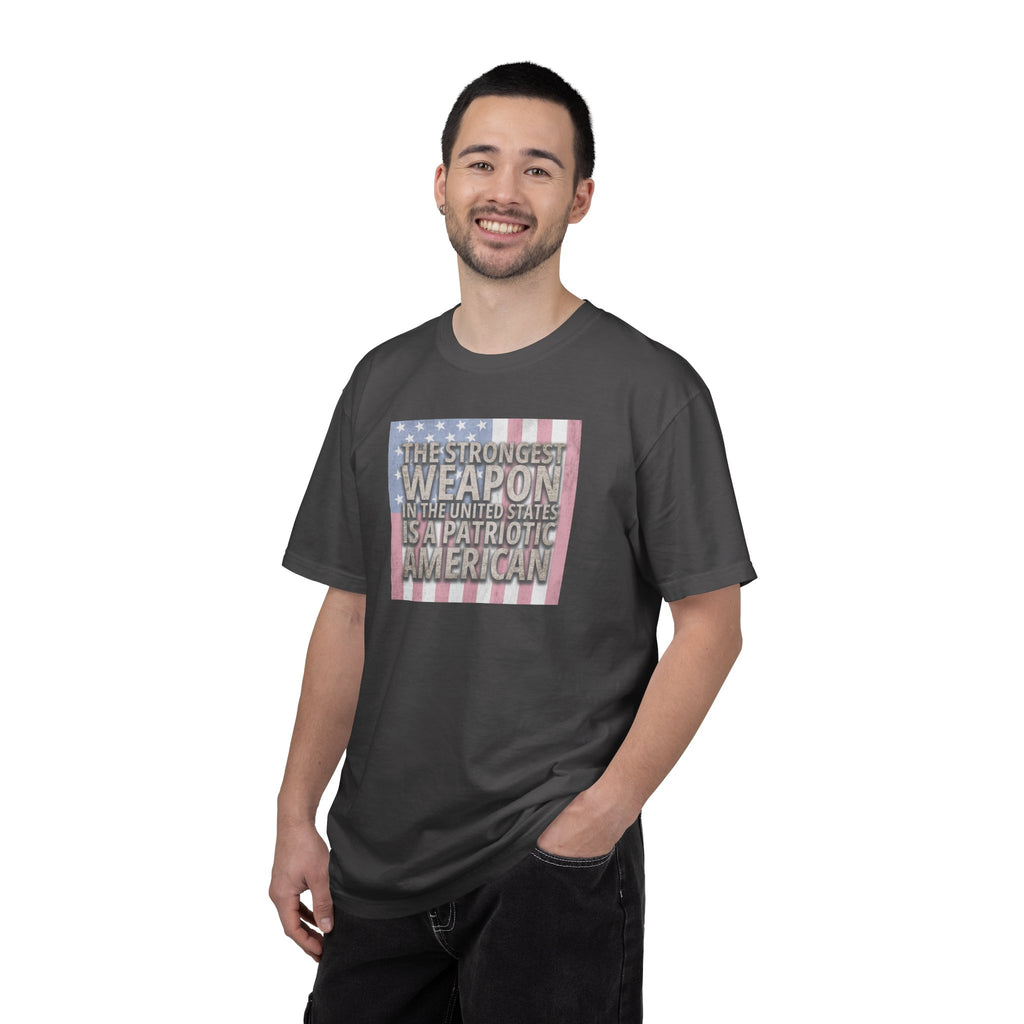 man wearing 'The Strongest Weapon in the United States is a Patriotic American' t-shirt in graphite
