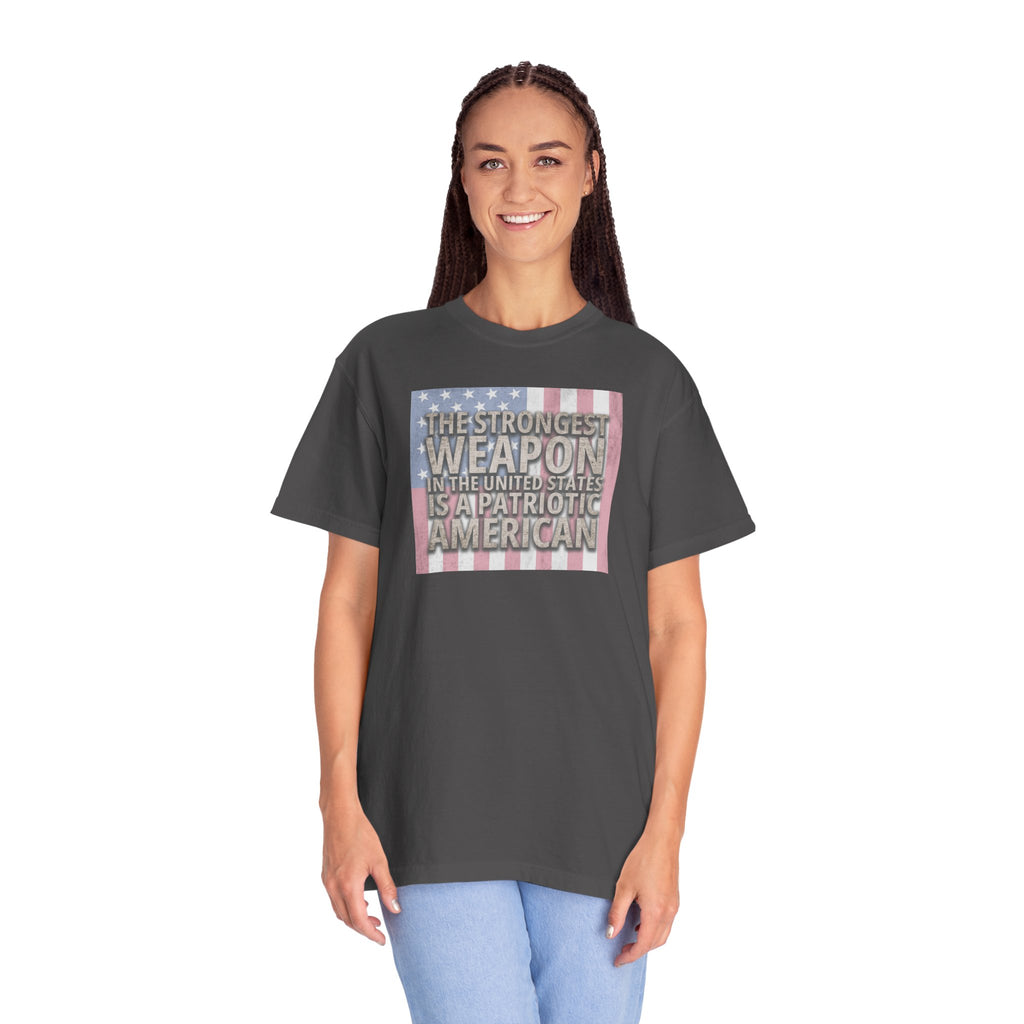 woman wearing oversized 'The Strongest Weapon in the United States is a Patriotic American' t-shirt in graphite