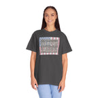 woman wearing oversized 'The Strongest Weapon in the United States is a Patriotic American' t-shirt in graphite