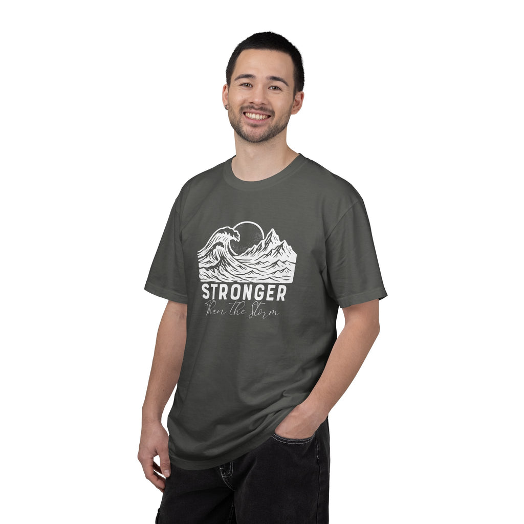Man wearing Stronger Than The Storm faith t-shirt in Pepper